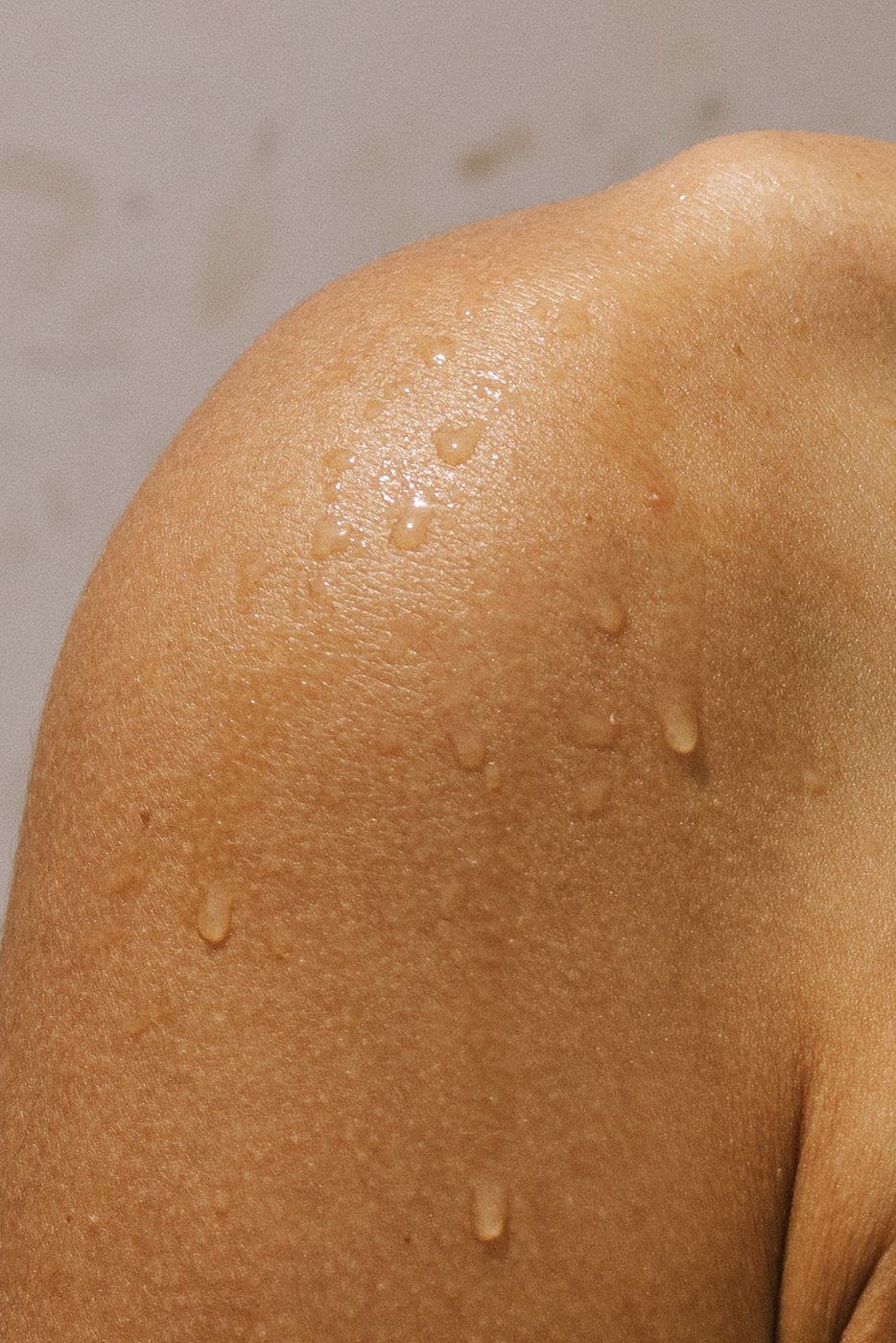 Water Droplet on Person's Shoulder